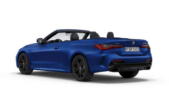 Vista laterale a tre quarti della BMW M440i xDrive Cabrio G23 2020 BMW M440i xDrive Cabrio BMW Individual Frozen Portimao Blue metallizzato G23 2020 Vista laterale a tre quarti