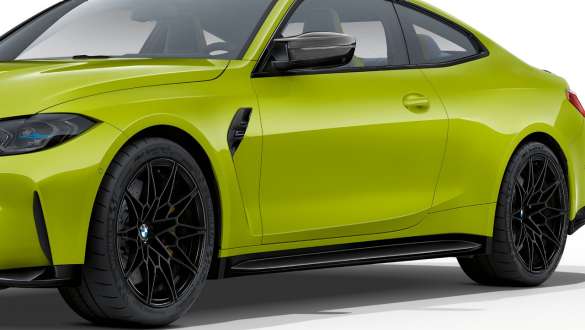 Vista laterale della BMW M4 Competition Coupé G82 2020 BMW M4 Competition Coupé G82 2020 Vista laterale.