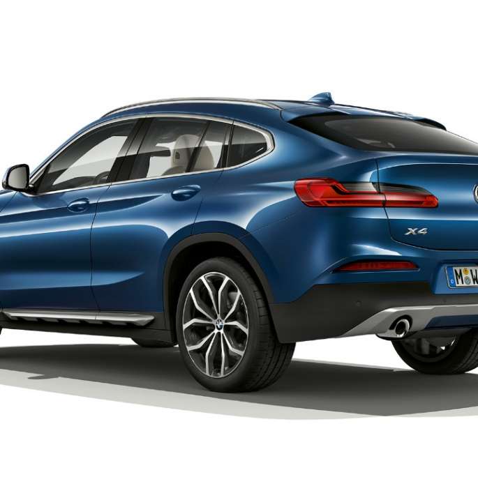 Vista posteriore a tre quarti della BMW X4 Versione xLine G02 BMW X4 xDrive20d Versione xLine G02 2018 Phytonic Blue Vista posteriore a tre quarti