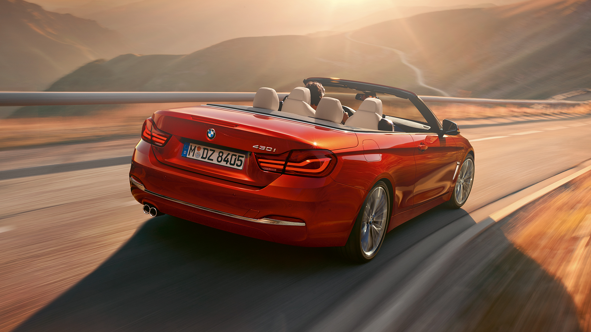 BMW Serie 4 Cabrio, ripresa in movimento posteriore BMW Serie 4 Cabrio, ripresa in movimento posteriore