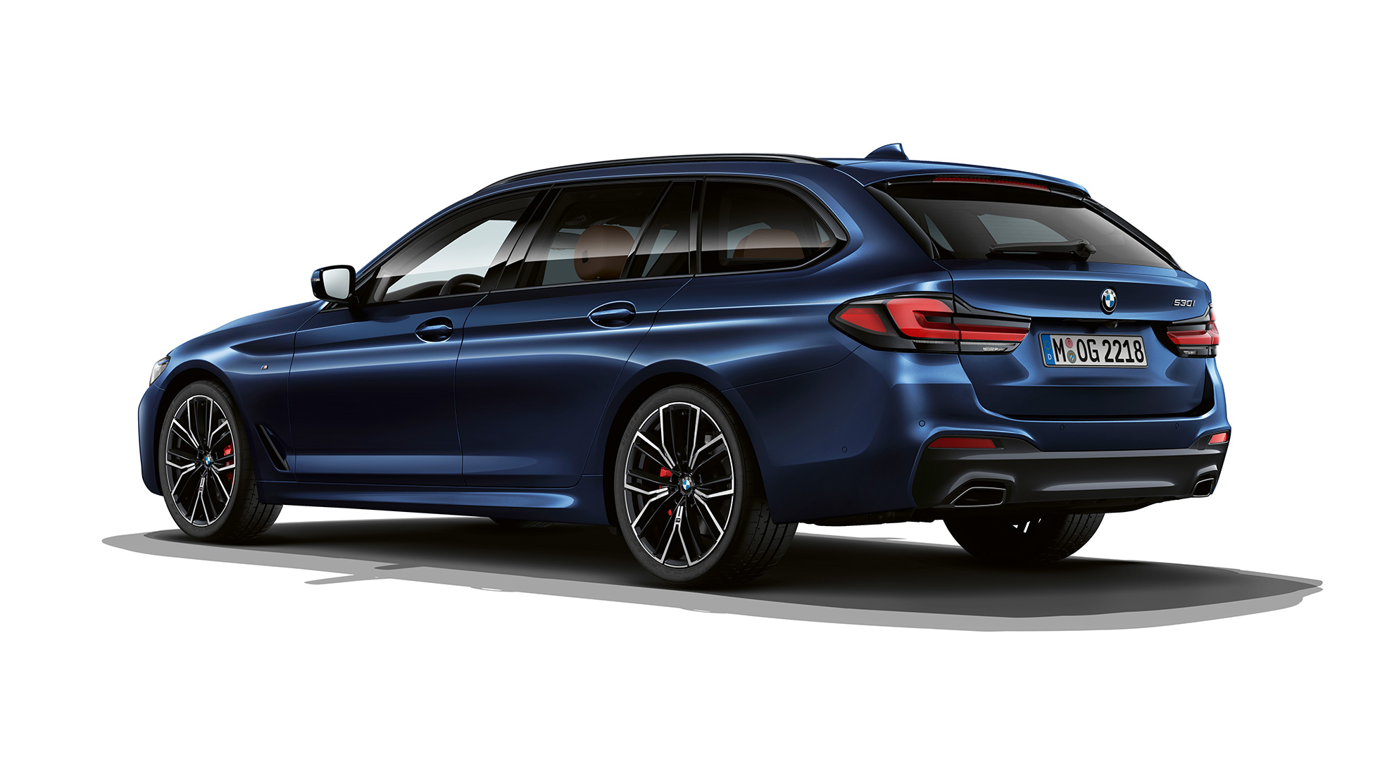 BMW Serie 5 Touring G31 pacchetto sportivo M, vista posteriore BMW Serie 5 Touring 530e G31 2020 pacchetto sportivo M in Tanzanite Blue II metallizzato, vista posteriore a tre quarti