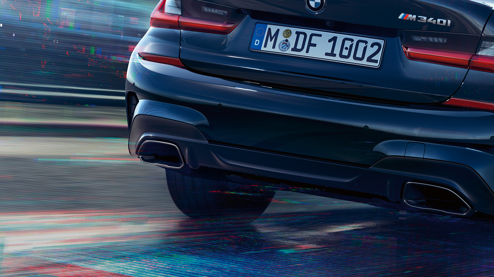 Modanature dei terminali di scarico della BMW M340i xDrive Berlina Modanature dei terminali di scarico della BMW M340i xDrive Berlina G20 Sapphire Black metallizzato primo piano