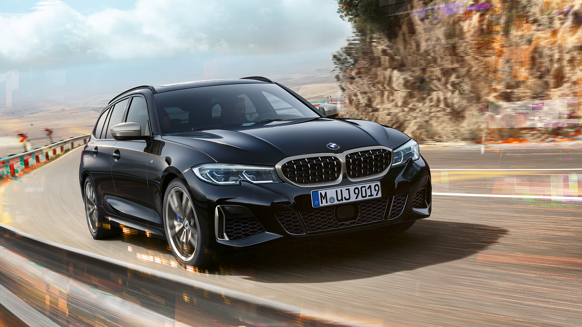 Design del doppio rene e prese d’aria G21 BMW M340i xDrive Touring, design del frontale con doppio rene e prese d’aria G21