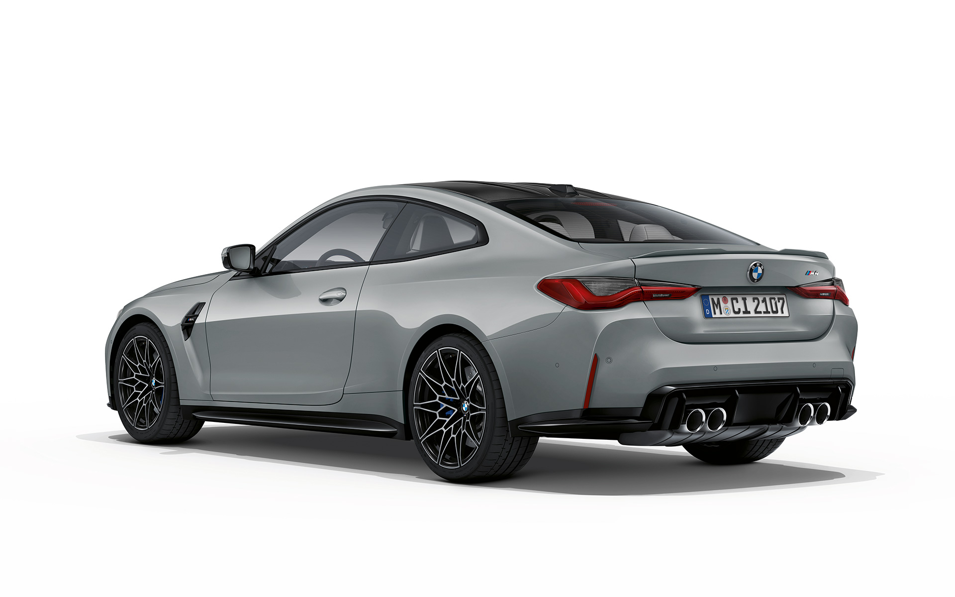 BMW M4 Coupé G82 2020 Brooklyn Grau metallizzato Vista posteriore a tre quarti