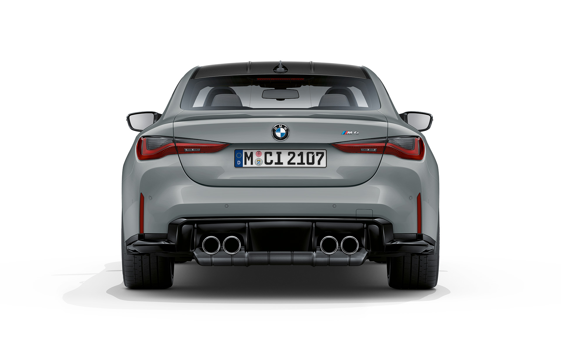BMW M4 Coupé G82 2020 Brooklyn Grau metallizzato vista posteriore 