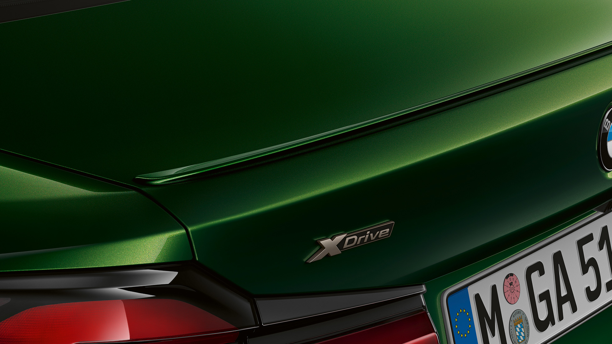 Spoiler posteriore della BMW M550i xDrive Berlina G30 LCI Facelift 2020 primo piano posteriore Spoiler posteriore della BMW M550i xDrive Berlina G30 LCI Facelift 2020 Hermes Green BMW Individual metallizzato primo piano posteriore