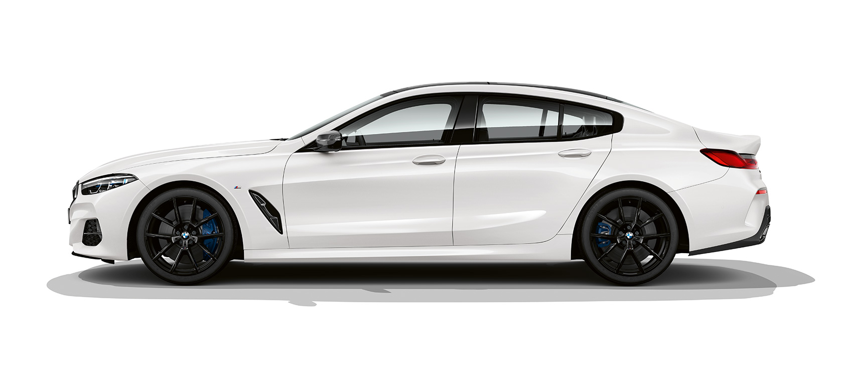 BMW M850i xDrive Gran Coupé, vista laterale G16 BMW M850i xDrive Gran Coupé G16 2019 BMW Individual Mineral White metallizzato, vista laterale