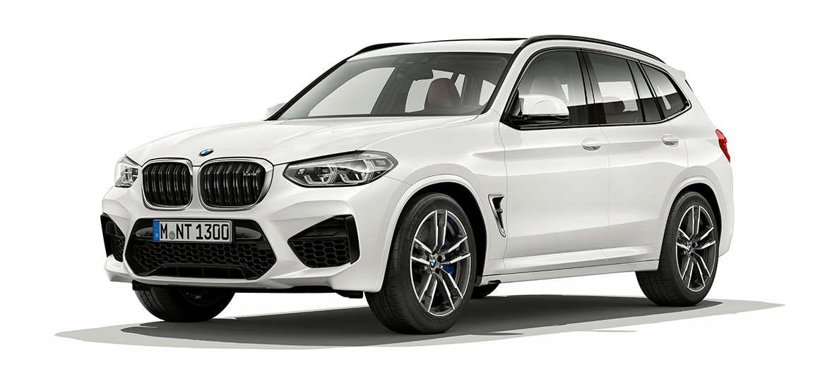 BMW X3 M, vista laterale a tre quarti. F97 BMW X3 M in Alpine White, esterni, vista laterale a tre quarti. F97