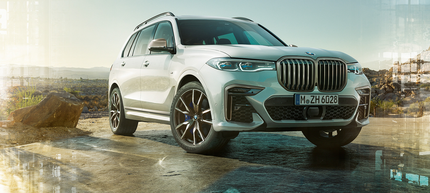 Automobile BMW X7 M G07 2019 Vista anteriore a tre quarti Automobile BMW X7 M G07 2019 Mineral White Vista anteriore a tre quarti ferma