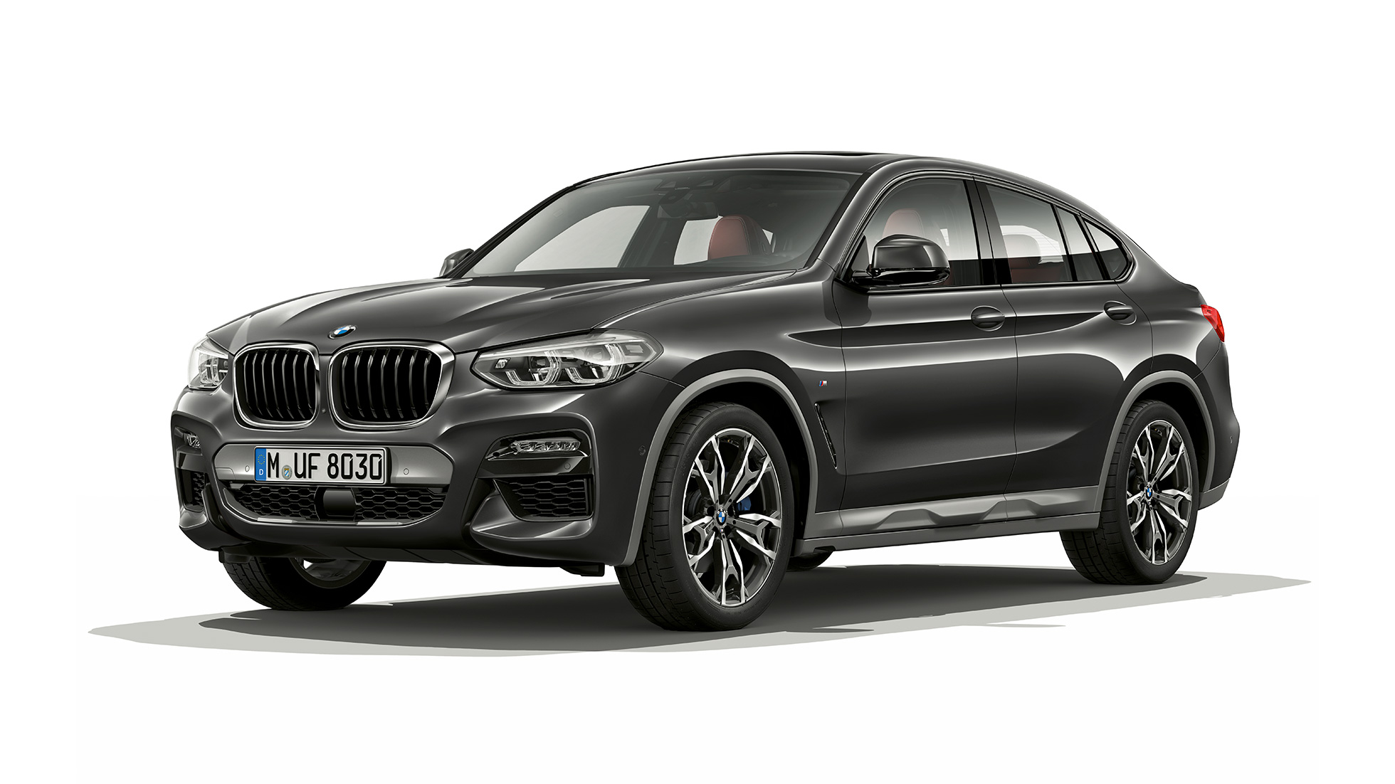 Vista anteriore a tre quarti della BMW X4 Versione M Sport X G02 BMW X4 xDrive30i versione M Sport X G02 2018 Sophisto Grey brilliant effect vista posteriore a tre quarti