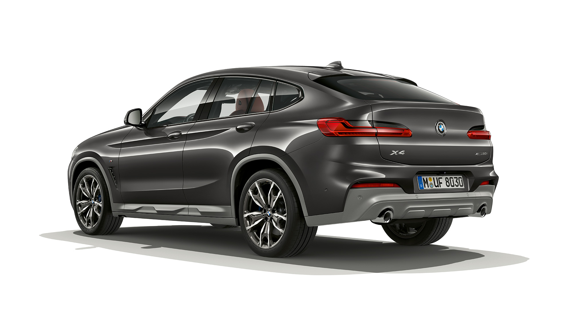Vista posteriore a tre quarti della BMW X4 versione M Sport X G02 BMW X4 xDrive30i versione M Sport X G02 2018 Sophisto Grey brilliant effect vista posteriore a tre quarti