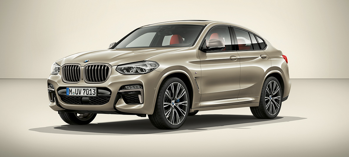 BMW Individual Sun Stone metallizzato della BMW X4 G02 Collezione BMW Individual della BMW X4 G02 2018 Sun Stone metallizzato vista laterale a tre quarti