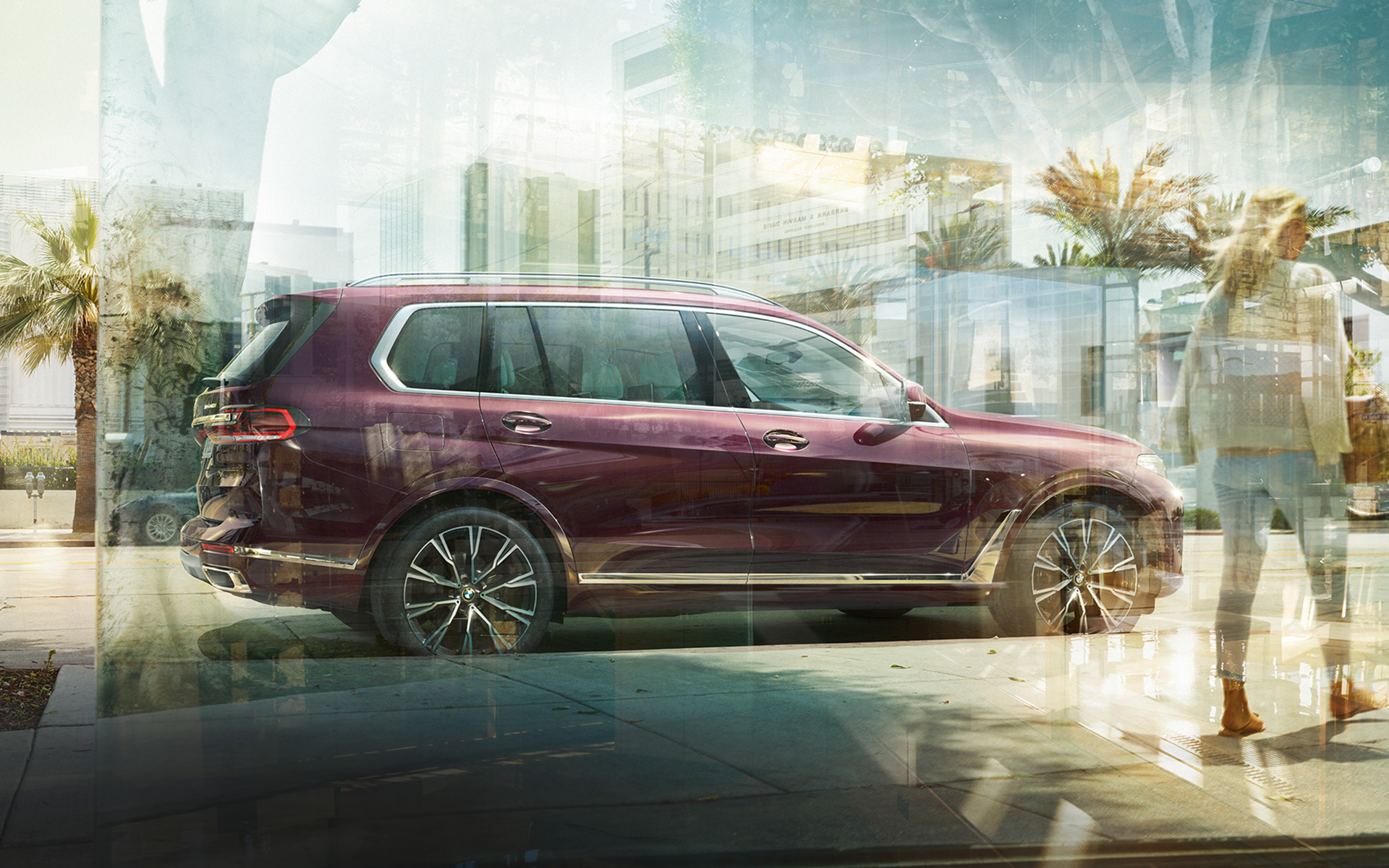 BMW X7 Individual xDrive40i G07 2018 Ametrin metallizzato vista laterale parcheggiata in città BMW X7 Individual xDrive40i G07 2018 Ametrin metallizzato vista laterale parcheggiata in città